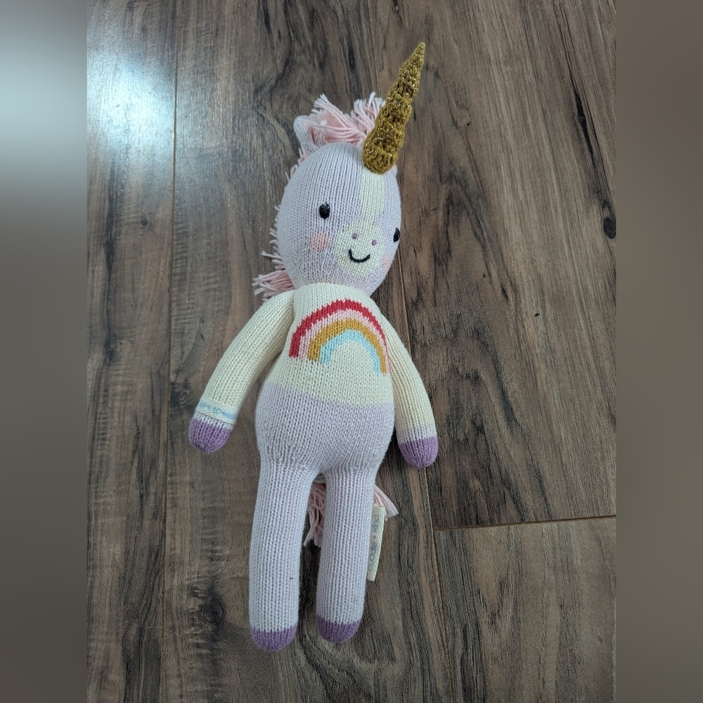 Zoe the unicorn hand knitted Cuddle + Kind doll. Unicorn stuffed animal.